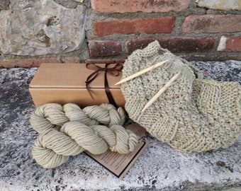 Circular needles kit with two skeins of wool or alpaca, pattern to knit a chunky textured cowl. Beginners knitting box with plant dyed yarn