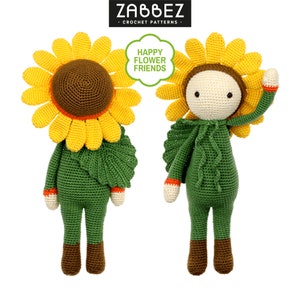 Puede incluir: Dos muñecas de crochet con forma de girasol con hojas verdes y detalles naranjas. Las muñecas llevan sombreros de girasol y tienen zapatos marrones. El texto "HAPPY FLOWER FRIENDS" está en un bocadillo de diálogo verde.