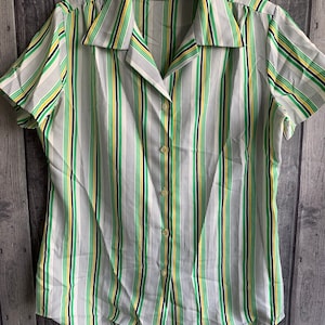 Elite 1980’s Vintage multi striped short sleeved blouse