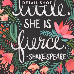 May include: Black background with white text that reads "little, she is fierce. -SHAKESPEARE" surrounded by colourful flowers and leaves.