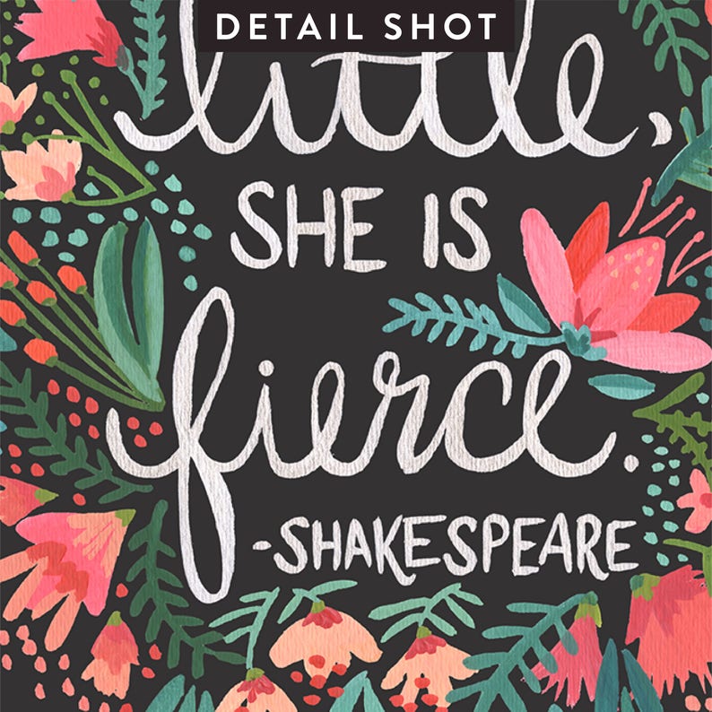 May include: Black background with white text that reads "little, she is fierce. -SHAKESPEARE" surrounded by colourful flowers and leaves.