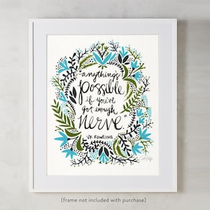 May include: A white framed print with a floral wreath design in shades of green, blue, and black. The quote "anythings possible if you've got enough nerve" is written in black script inside the wreath. The quote is attributed to J.K. Rowling.