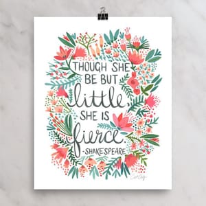 May include: A floral print with a quote from Shakespeare that reads "Though she be but little, she is fierce." The quote is in black text and the flowers are in shades of pink, red, and green.