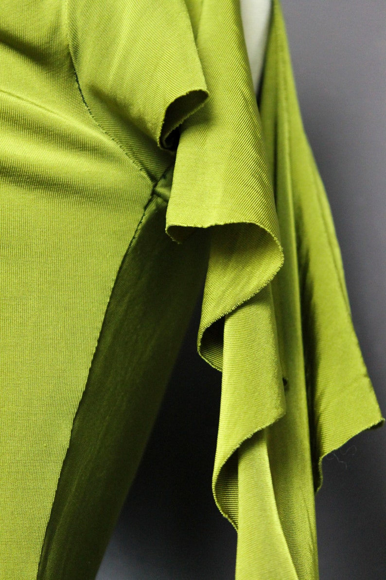 Green women evening dress knee-length pistachio green jersey cowl neck shoulders bare cascade of ruffles embroidered white rose rhinestone fuchsia TM