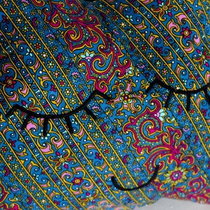 Cloud cushion doudou cotton blue duck printed cashmere pattern turquoise fuchsia embroidered serene face too cute black thread made in France