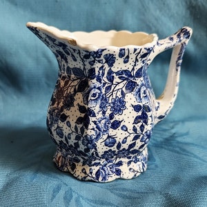 Small Porcelain creamer-British style.