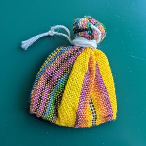 Guatemalan worry doll bag with 5 miniature worry dolls and explanation of legend of worry dolls