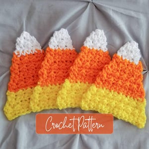 May include: Four triangular crochet candy corn decorations featuring a white top section, an orange middle section, and a yellow bottom section. The text Crochet Pattern is printed in white cursive font on an orange rectangular background.