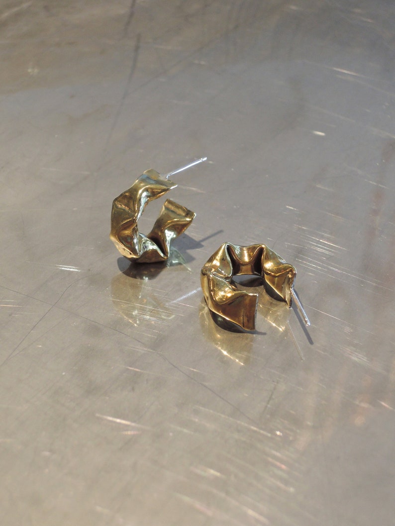 Puffy golden brass semi hoop earrings with silver post