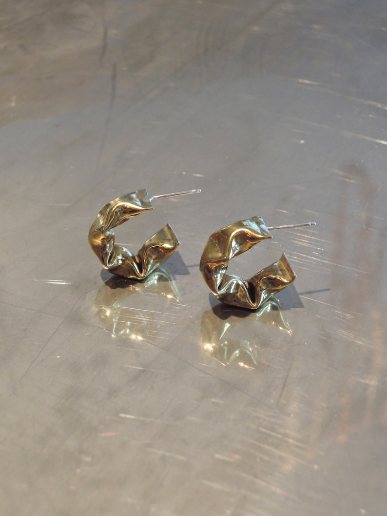 Puffy golden brass semi hoop earrings with silver post