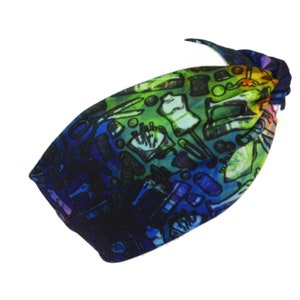 May include: A colorful headband with a pattern of sewing tools and supplies. The headband is made of a soft, stretchy fabric and is perfect for keeping your hair out of your face.