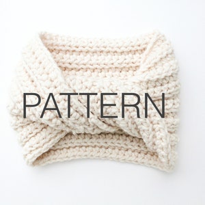 May include: A white crocheted headband with a twisted knot design. The headband is made with a chunky yarn and has a simple, minimalist style. PATTERN.