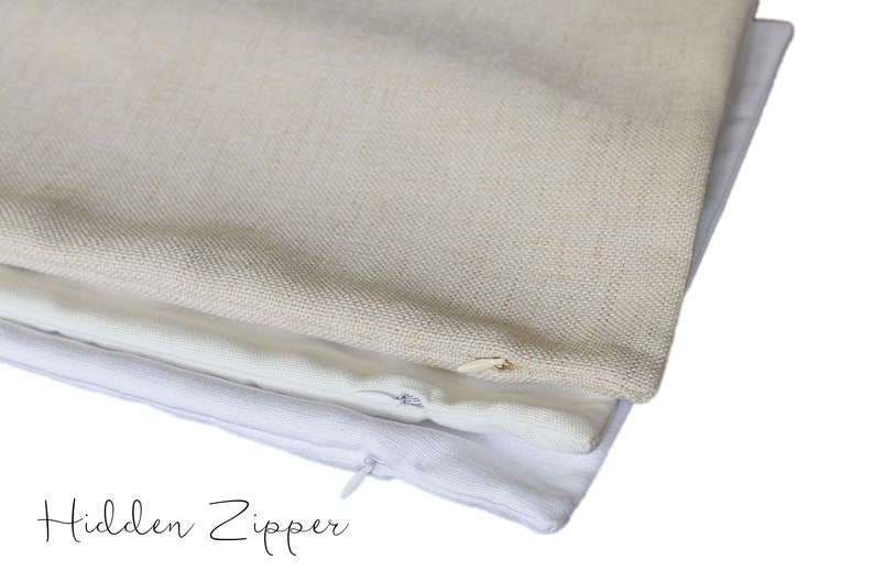 May include: Close-up of three pillow covers in neutral tones. The top pillow cover is a light beige linen, the middle one is a white linen, and the bottom one is white cotton. The words "Hidden Zipper" are written in cursive.