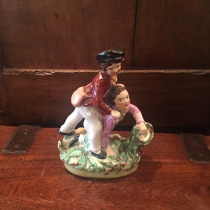Staffordshire Figure Of Boys Playing