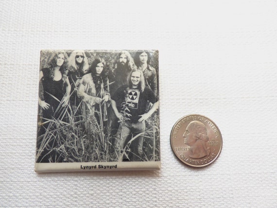 5 1970's LYNYRD SKYNYRD Pin Back Buttons Pic from back cover of 1st Album 5 1970's LYNYRD SKYNYRD Pin Back Buttons Pic from back cover of 1st Album