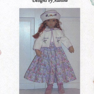 May include: A doll wearing a white felt jacket and a purple and white floral dress. The doll is wearing a white hat with a floral design. The doll is standing on a white background. The text "The Patchwork Pansy's Doll Dress Pattern for 25" to 28" Himstedt Dolls Designs by Adeline #2841 Felt Jacket & Sleeveless Dress Copyright © 2/2004 by Adeline Salvesen, The Patchwork Pansy" is printed on the image.