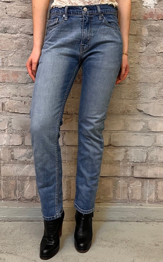 Levis 513 brown sale