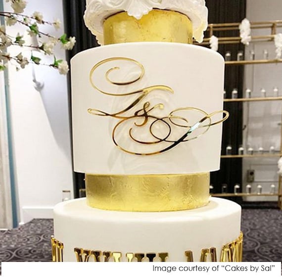 Chanel swag for 50th birthday - Decorated Cake by Willene - CakesDecor