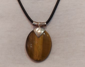 Pendant ** tiger eye ** in a stable silver setting