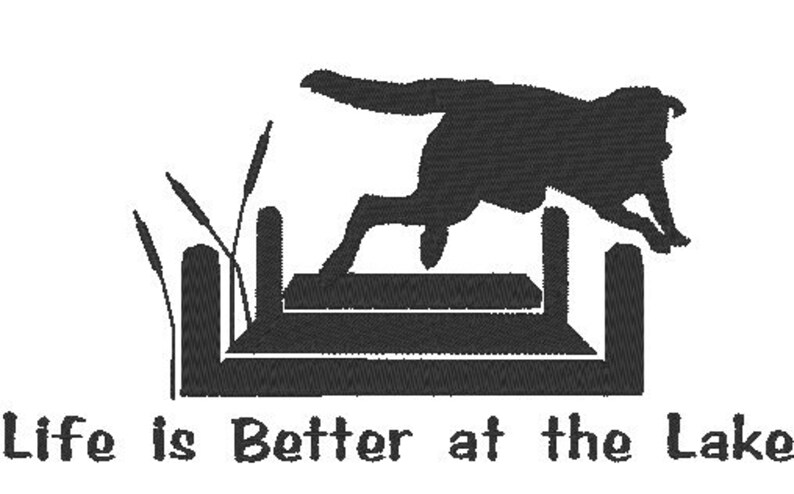 May include: Black embroidered design featuring a dog leaping over a wooden dock, with cattails on the left. The text "Life is Better at the Lake" is below the image. The design is on a white background.