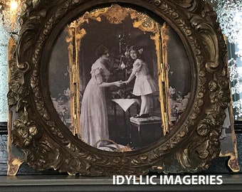 Photo (digital download) of a still life of an old mirror and a framed old photograph