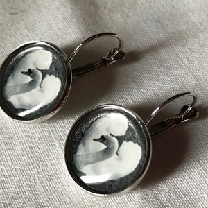 Earrings with a black and white photo of a swan. image 3