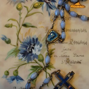 Antique French communion card with light blue rosary.