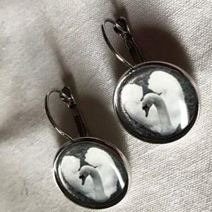 Earrings with a black and white photo of a swan. image 2