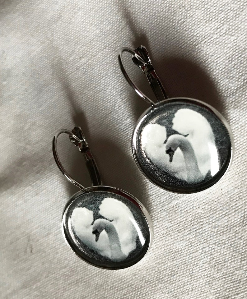 Earrings with a black and white photo of a swan. image 2