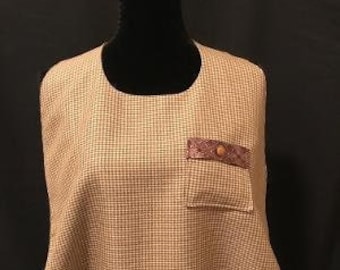 Adult bib for men in tan with small brown checks and pocket accent. Dignified clothing protection while dining by Classy Clothing Covers.