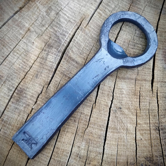 Hammered out by an actual blacksmith — the irregular, hand-forged texture makes every piece slightly different and tells the whole story of how it was made.