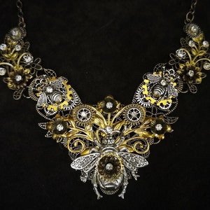 Steampunk  Art Nouveau Silver Bee and Gold Filigree Bronze Articulated Necklace with gears, flowers, leaves and crystals