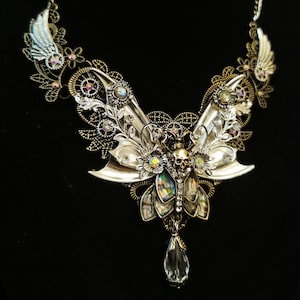 Gothic Art Nouveau Death's Head Hawkmoth Steampunk Goth articulated necklace with antique silver wings, abalone-style moth, and crystal drop