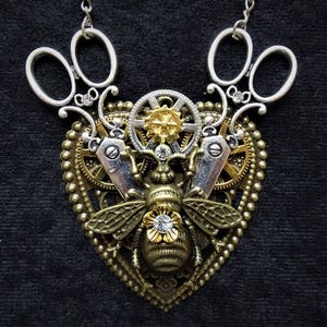 Steampunk Sewing Bee Bronze Heart-shaped Pendant Necklace with bronze bee, silver scissors charms and Steampunk mechanical gears and cogs