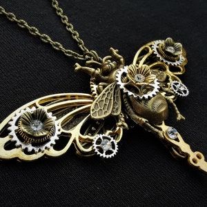 Queen Bee pendant necklace with bronze bee, dragonfly, golden butterfly wings, clock hand, diamante crystals and Steampunk mechanical gears