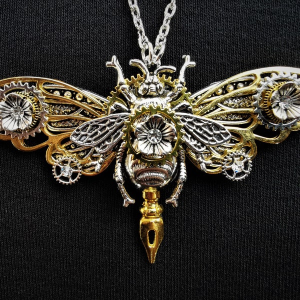 Beautiful Steampunk Queen Bee pendant necklace with silver queen bee and dragonfly, golden butterfly wings & pen nib, + rhinestone crystals