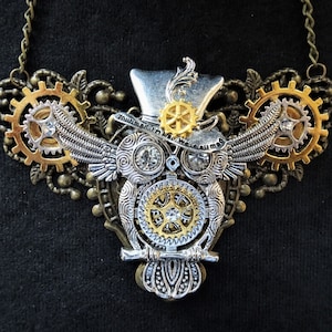 Steampunk jewelry Owl in top hat bib necklace - bronze filigree base, silver winged owl and top hat charms, golden cogs gears & rhinestones