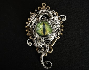 Fabulous Goth Fantasy-themed Steampunk Year of the Dragon pin brooch with green eye, curled silver dragon, flowers and diamante rhinestones