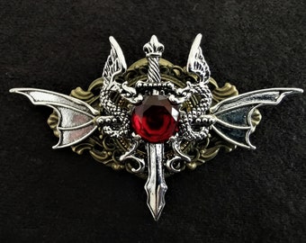 Gorgeous Goth jewelry brooch - Gothic Steampunk Fantasy-themed pin brooch with silver dragons, sword, and ruby red crystal rhinestone