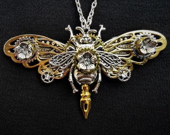 Beautiful Steampunk Queen Bee pendant necklace with silver queen bee and dragonfly, golden butterfly wings & pen nib, + rhinestone crystals