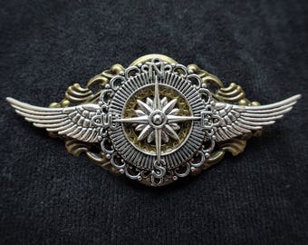 Steampunk Airman Aviator Pilot Explorer Pin Badge and Brooch - Winged flying travel lover's pin badge brooch featuring silver compass charm