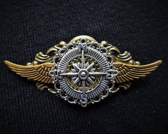 Steampunk Airman Aviator Pilot Explorer Pin Badge and Brooch - Winged flying travel lover's pin badge brooch featuring silver compass charm