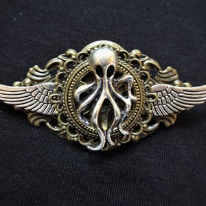 Steampunk Gothic Goth Fantasy Winged Kraken pin badge & brooch - featuring silver miniature Kraken Octopus Cthulhu Giant Squid figure