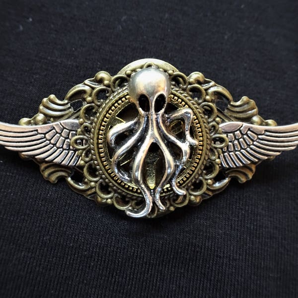 Steampunk Gothic Goth Fantasy Winged Kraken pin badge & brooch - featuring silver miniature Kraken Octopus Cthulhu Giant Squid figure