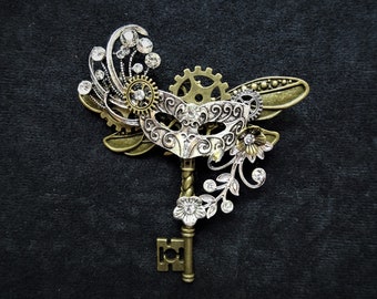 Romantic Steampunk pin brooch - Fairytale Masquerade Mardi Gras Masked Ball Cinderella Bronze key with silver mask and bronze dragonfly