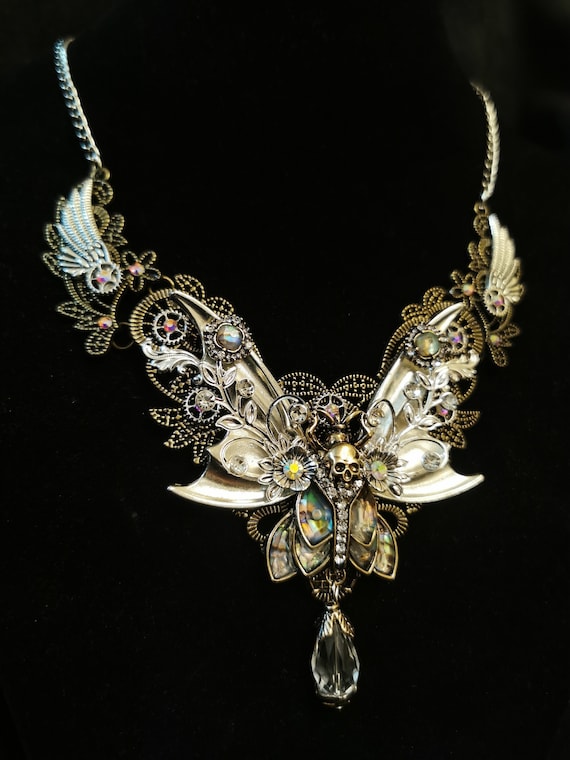 Gothic Art Nouveau Death's Head Hawkmoth Steampunk Goth articulated necklace with antique silver wings, abalone-style moth, and crystal drop