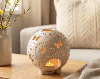 Theelichthouder vlinder: decoratief middelpunt van kaarslantaarn