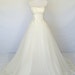 Sandra Robles reviewed Beautiful One Shoulder Wedding Dresses Sweetheart ,Tulle applique, Crystal Beaded White Wedding Dress/Bridal Bride Gowns