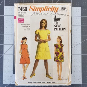 May include: A vintage Simplicity sewing pattern envelope featuring a yellow, orange, and floral print dress design. The pattern number is 7460 and the title is "A 'How to Sew' Pattern".