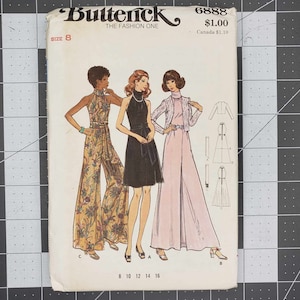 May include: A vintage Butterick sewing pattern with illustrations of women's fashion. The pattern shows a halter-neck jumpsuit, a black dress, and a pink trouser suit. The pattern size is 8, with other sizes available.
